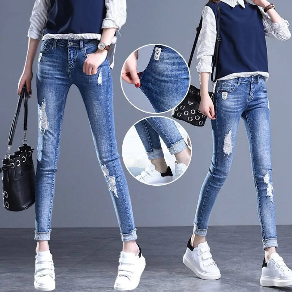 Vintage High Waisted Ripped Jeans